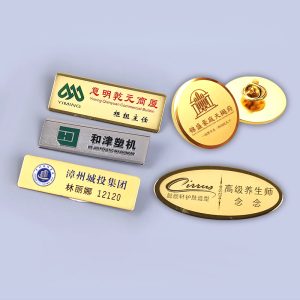 Assorted Chinese branded metal nameplates and badges.