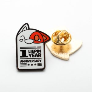 Fox character enamel pin celebrating one year anniversary