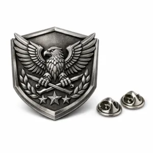 A high-detail 3D raised emblem badge in antique silver finish, crafted from zinc alloy with a prominent 3D relief surface and crisp beveled edge. Features a secure butterfly clutch pinback. Perfect for elegant branding or organization insignias.