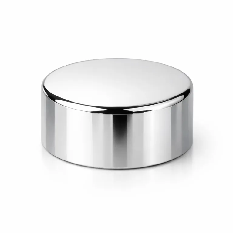 A sophisticated cosmetic bottle cap cover crafted from zinc alloy with a glossy nickel plating, featuring soft rounded edges and a polished mirror surface for a sleek, modern look.