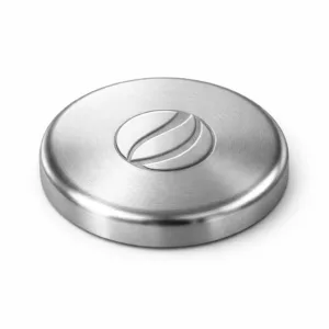 A custom logo metal lid crafted from zinc alloy with a brushed silver finish. Features a round profile, soft rounded edge, and a refined 3D relief emblem, giving it a premium look suitable for various containers.
