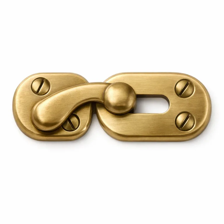A die-cast decorative clasp made with brass, highlighted by a brushed matte finish and soft rounded edges for a refined look. Designed for elegant fastening solutions.