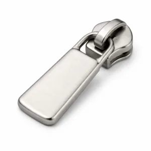A die-cast zipper pull tab made from zinc alloy with a matte nickel finish, featuring a smooth rectangular silhouette and soft rounded edges, photographed against a white background for a clean, professional presentation.