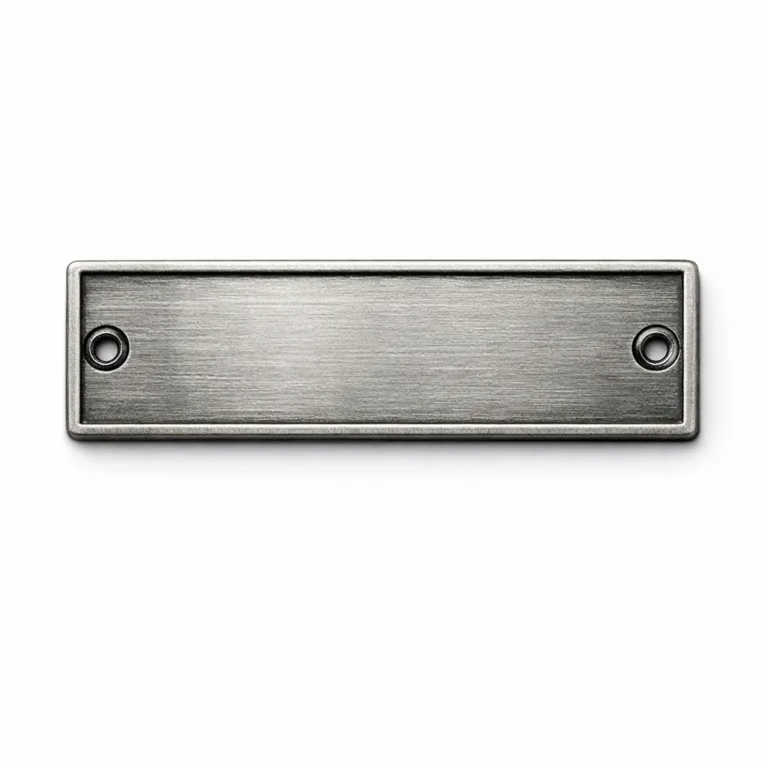 A die-cast zinc alloy nameplate, rectangular with antique silver brushed surface and screw holes for secure attachment. Ideal for classic or industrial branding applications.