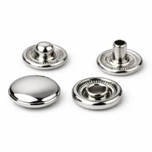 A highly realistic polished zinc alloy snap button cap featuring a shiny nickel electroplated finish and crisp beveled edge, photographed in studio e-commerce style.