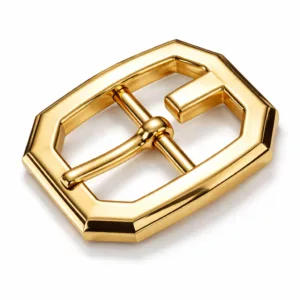 A zinc alloy gold-plated buckle featuring a crisp beveled edge and polished mirror surface for a premium look. The emblem logo detail is sharply defined, ideal for e-commerce product showcases.