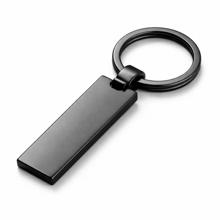 A matte black plated rectangular zinc alloy keychain, featuring a modern flat profile and a classic split ring attachment, shown in sharp detail against a white studio background.