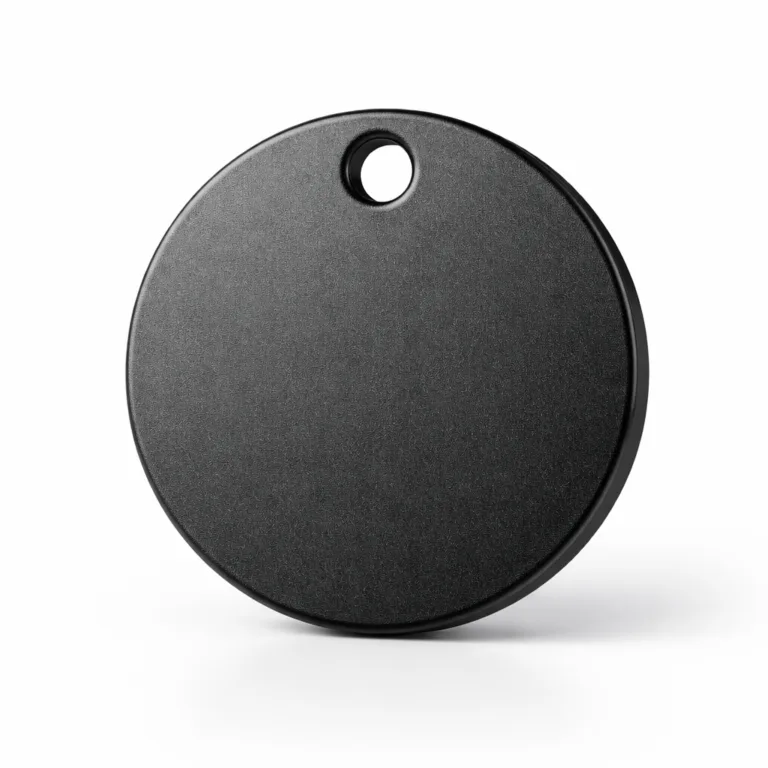 A round metal tag with a refined matte black plated finish on stainless steel. The crisp beveled edge and sandblasted texture provide a distinct tactile feel, making it ideal for industrial or elegant tagging needs.