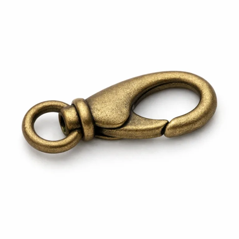 This necklace clasp hook is crafted from brass with an antique brass finish and features a sandblasted matte texture. The design includes soft rounded edges for a vintage look suitable for artisanal jewelry.