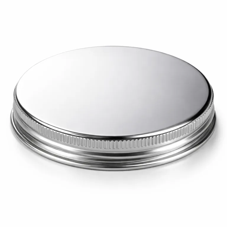 A stainless steel ribbed texture metal lid with a polished mirror finish and a distinct beveled edge, highlighting a premium and modern look for secure closures.