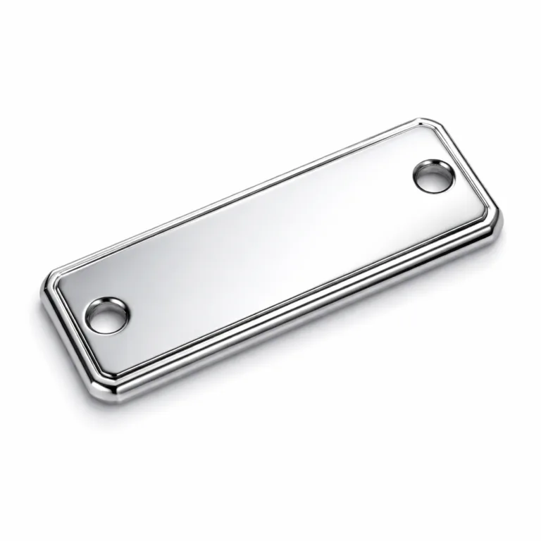 A high-shine, rectangular rivet-on metal clothing tag finished in polished mirror nickel, enhanced with a 3D embossed relief border and dual rivet holes for secure attachment. Modern, bold appearance for premium branding.