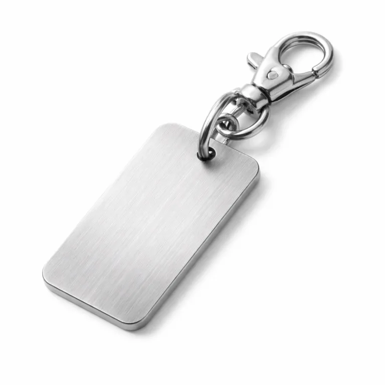 Modern serial number keychain tag made of stainless steel with a brushed matte finish and softly rounded edge for a minimal aesthetic. Features an easy-to-use lobster clasp attachment.