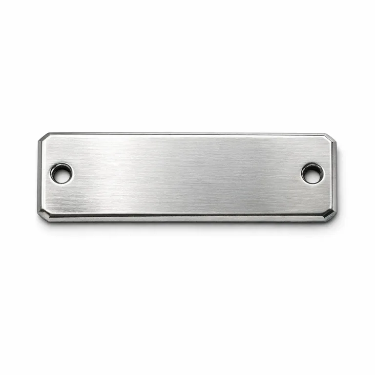 gr sew on metal brand tag brushed E-commerce studio photo of a brushed silver zinc alloy sew-on metal brand tag, rectangular with beveled edges, two precisely drilled sewing holes at each end. High clarity, neutral white background, sharp details perfect for online listing.