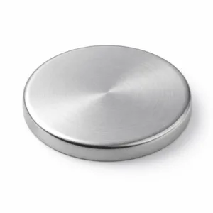 A flat stamped metal lid cover in zinc alloy with a brushed silver finish and soft rounded edge, photographed on a white background for e-commerce.