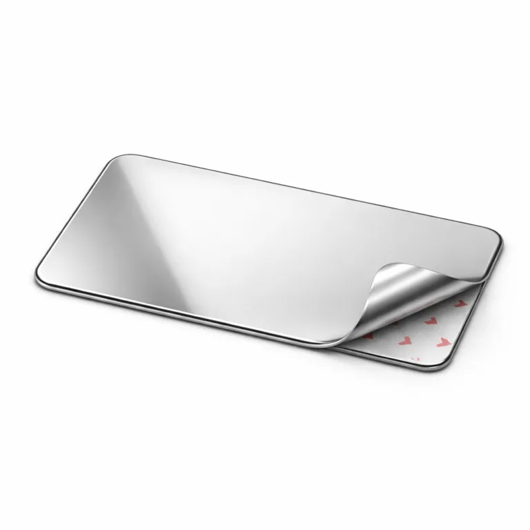 This stamped metal nameplate is crafted from stainless steel with a highly polished mirror finish and rounded corners. The reverse side features an adhesive strip for easy mounting on smooth surfaces, ideal for office or home use.