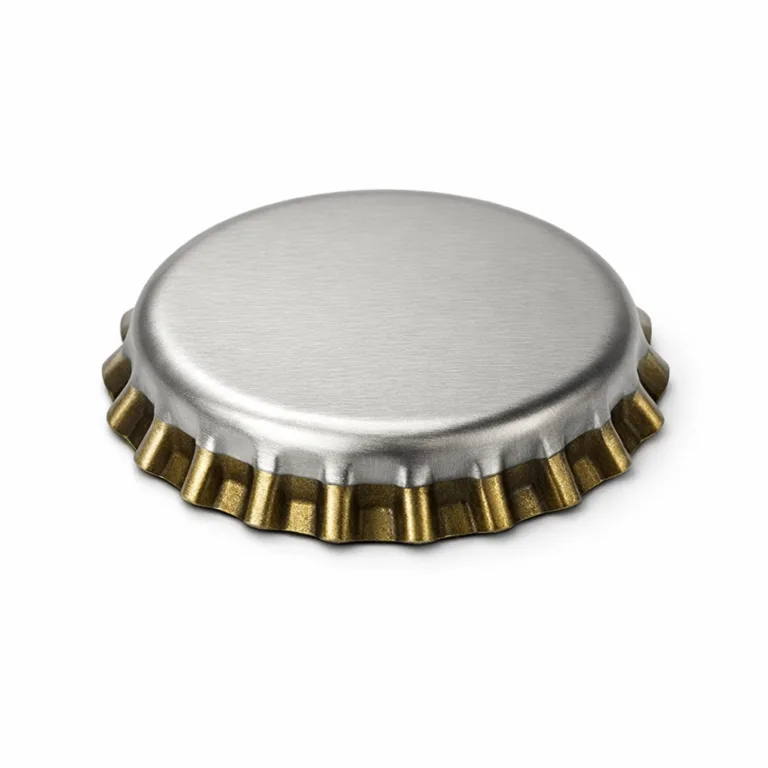 Studio image of a two-tone plated bottle cap in zinc alloy, rendered with a matte nickel and antique brass finish, flat 2D surface, and a gentle rounded edge to highlight manufacturable detail variations.