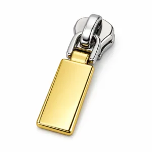 A zinc alloy zipper pull featuring a classic rectangular shape, soft rounded edges, and a polished mirror surface with a gold and shiny nickel two-tone plated finish. Ideal for elevating jackets and bags.