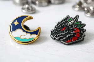 A professional studio image demonstrating the visual and tactile differences between hard enamel and soft enamel pins for comparison.