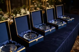 Photo captures a set of beautifully boxed corporate awards under soft lights, illustrating how high-end packaging enhances event prestige.