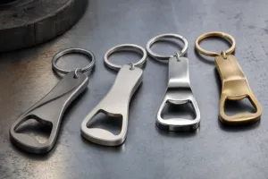 A realistic product image showing several metal keychain bottle opener styles in different materials for buyer comparison.